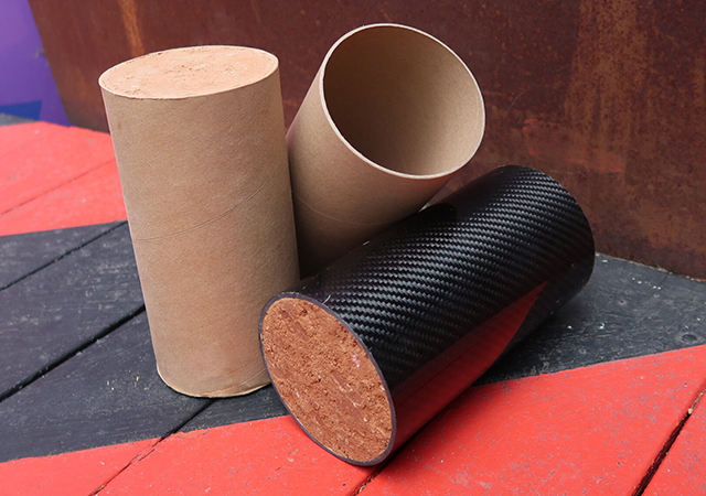 A cardboard-confined rammed earth column and a CFRP-confined rammed earth column.